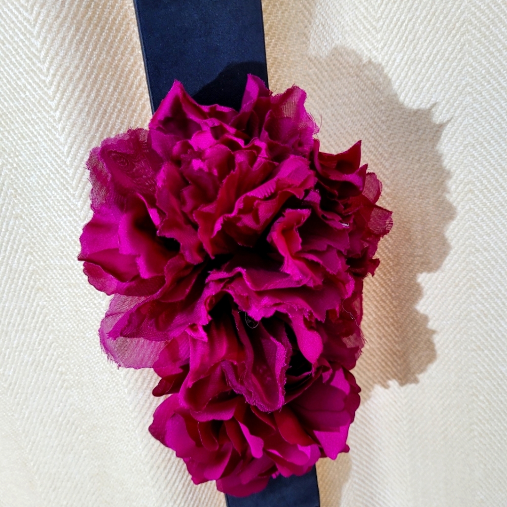 White House Black Market leather belt with fluffy floral red/purple accent